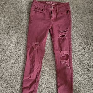 Maroon American Eagle Skinny jeans